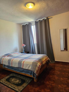 Habitación confortable frente a área verde y río con fauna silvestre con pista para ejercitarse